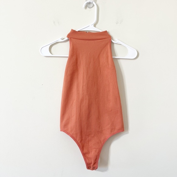 Fashion Nova Tops - Fashion Nova Pink Salmon Halter Neck Backless Ribbed Thong Bodysuit